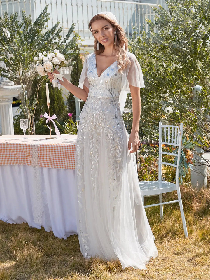 Skye | Robe de soirée en sequins à décolleté en V profond